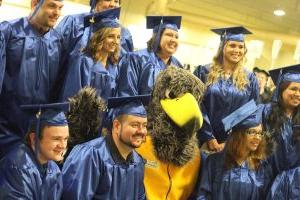 Graduation photo of graduates and Beacon